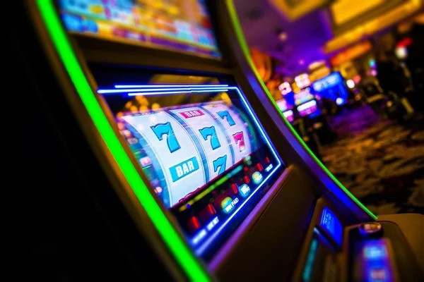Gem Saviour slot game interface showing coloured gem symbols and cluster win formations